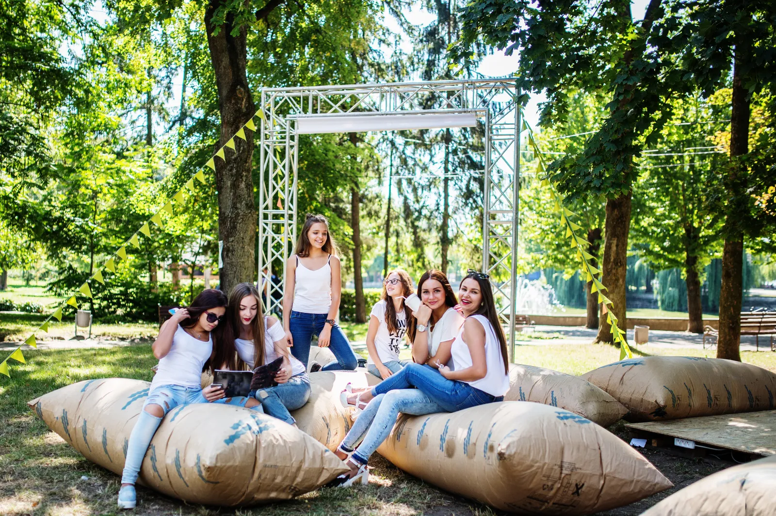 69ca729e7e503_six-young-happy-girls-having-fun-giant-pillows-park.webp